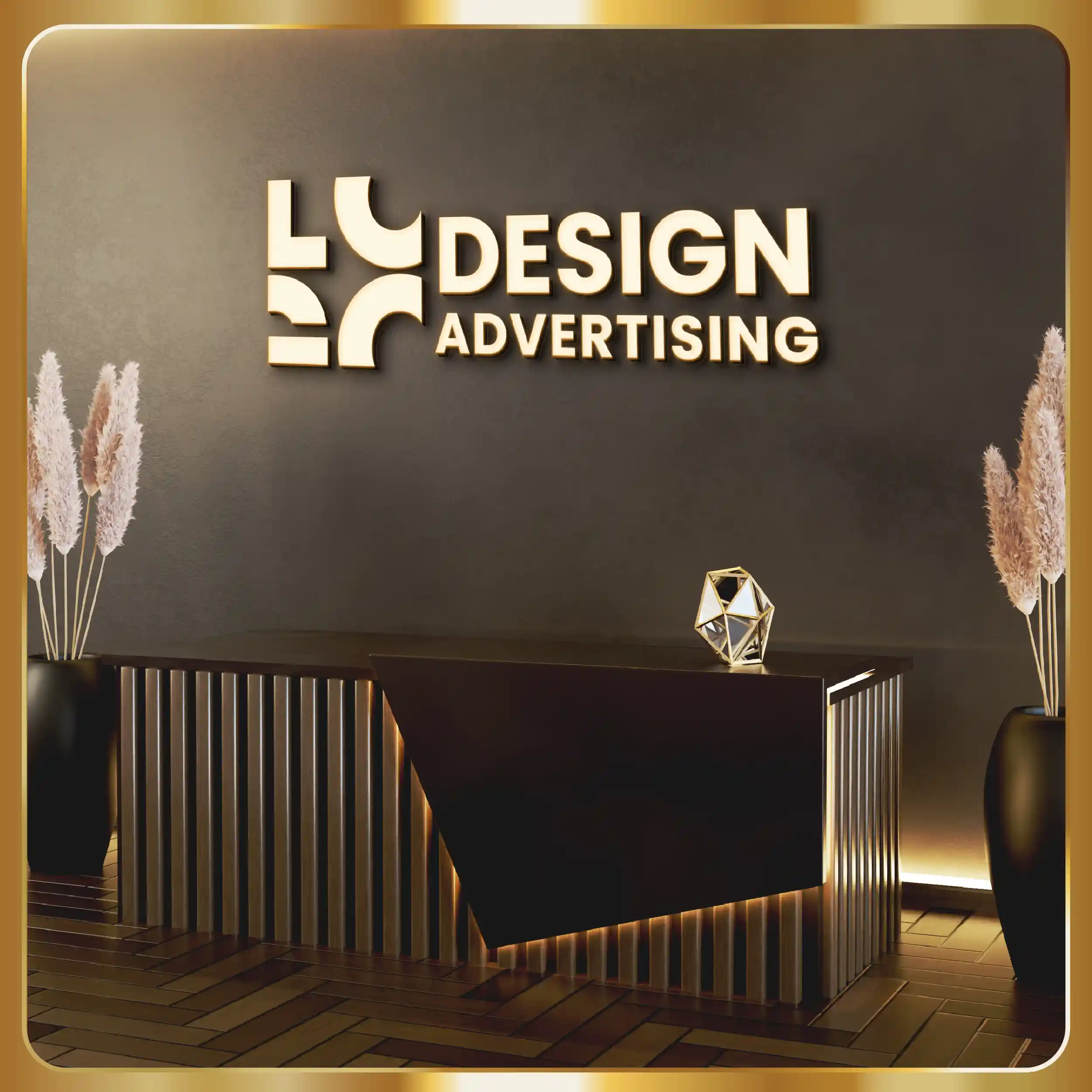 The logo for design advertising is on a desk in a room.